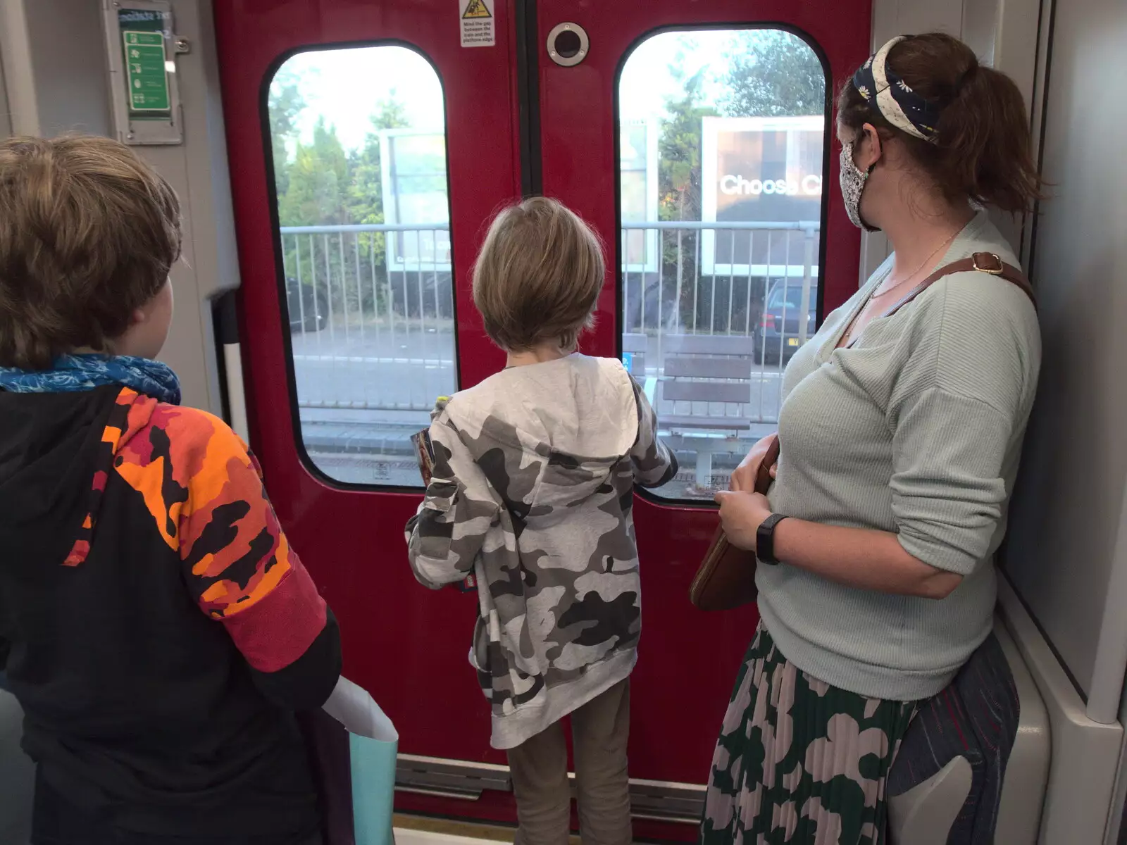 Harry waits for the doors as we get to Diss, from BSCC at Ampersand and Birthday Lego at Jarrold's, Norwich, Norfolk - 25th September 2021