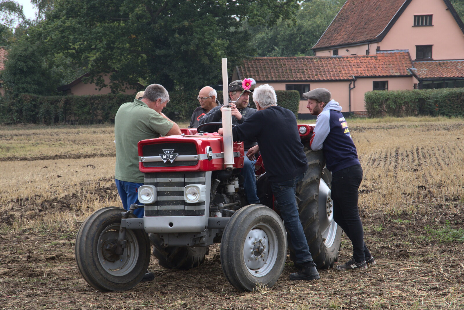 There's a conference over one of the tractors from Vintage Tractor Ploughing, Thrandeston, Suffolk - 26th September 2021