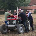 There's a conference over one of the tractors, Vintage Tractor Ploughing, Thrandeston, Suffolk - 26th September 2021