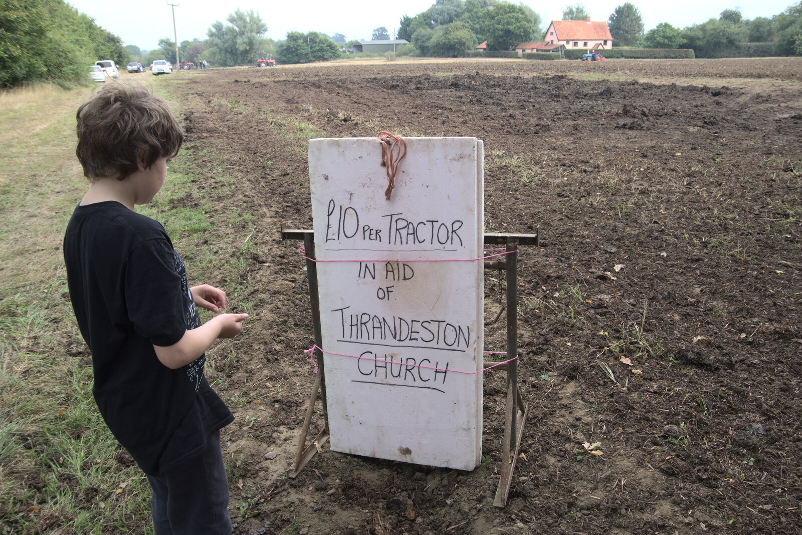 Fred considers the sign from Vintage Tractor Ploughing, Thrandeston, Suffolk - 26th September 2021