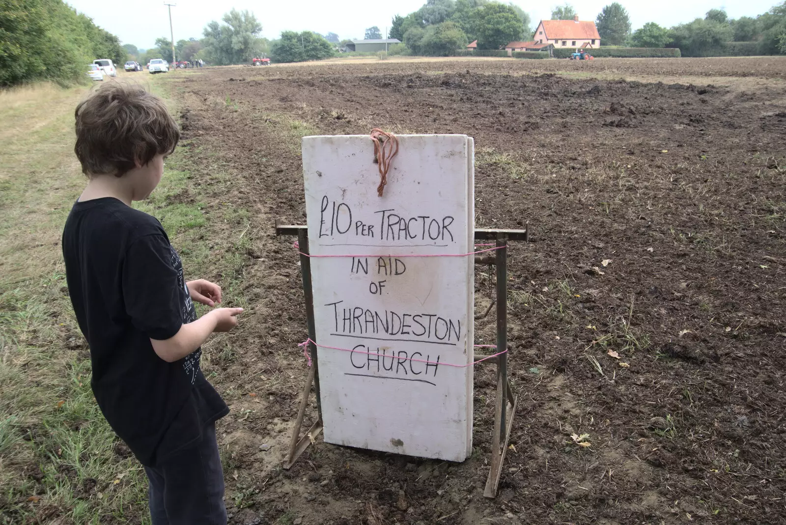 Fred considers the sign, from Vintage Tractor Ploughing, Thrandeston, Suffolk - 26th September 2021