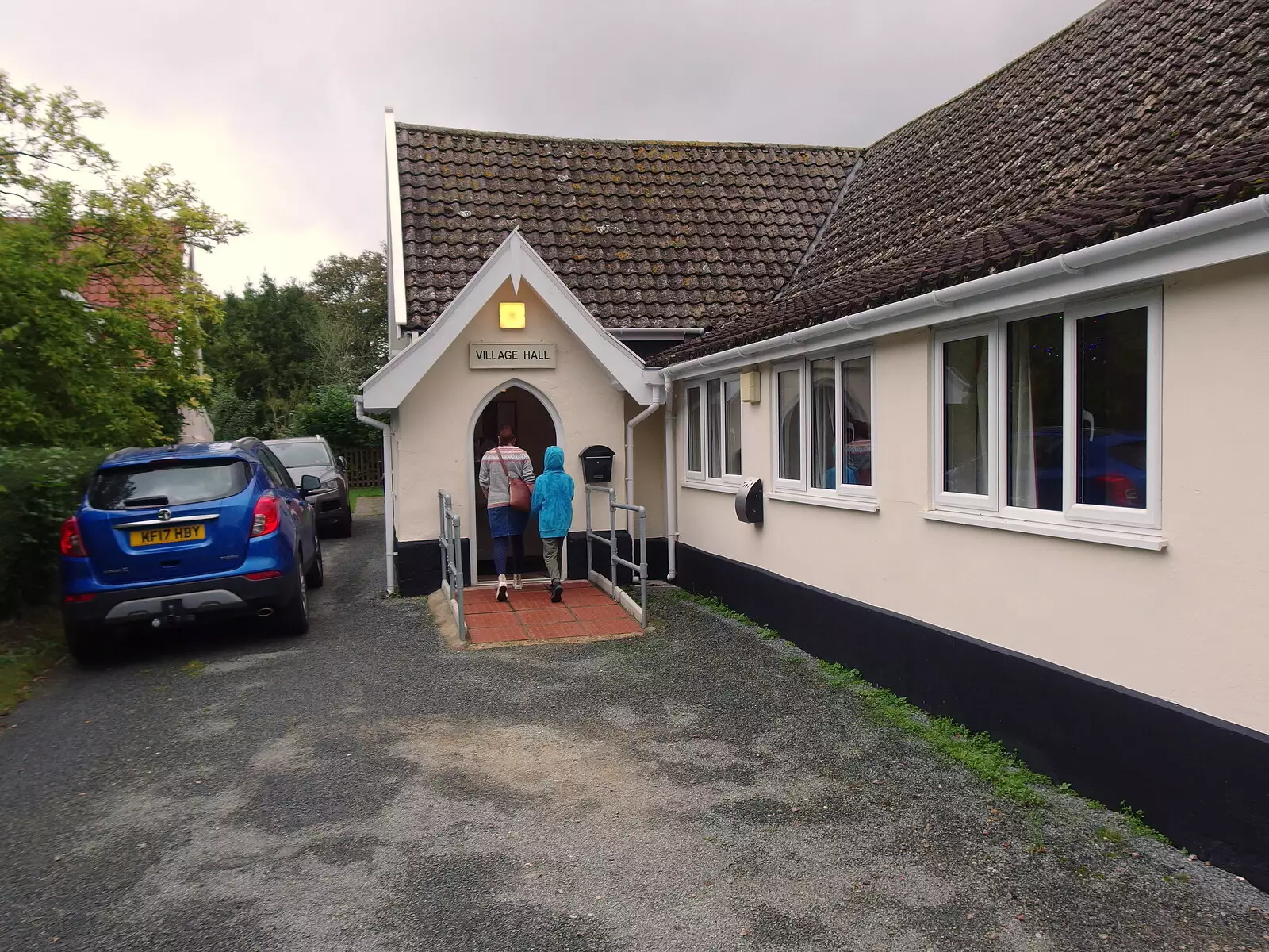 Isobel and Harry enter the village hall, from Sunday Lunch at the Village Hall, Brome, Suffolk - 10th October 2021