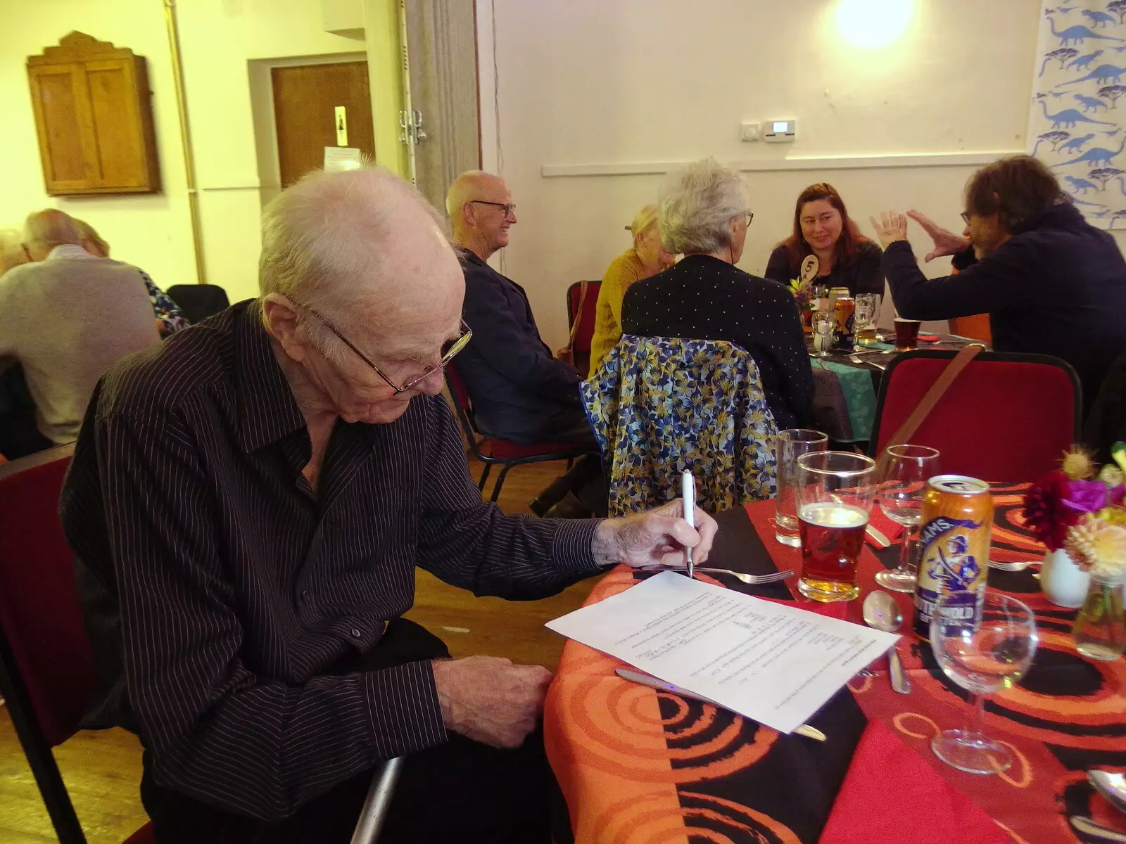 Grandad fills in a quiz, from Sunday Lunch at the Village Hall, Brome, Suffolk - 10th October 2021