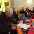 Grandad fills in a quiz, Sunday Lunch at the Village Hall, Brome, Suffolk - 10th October 2021