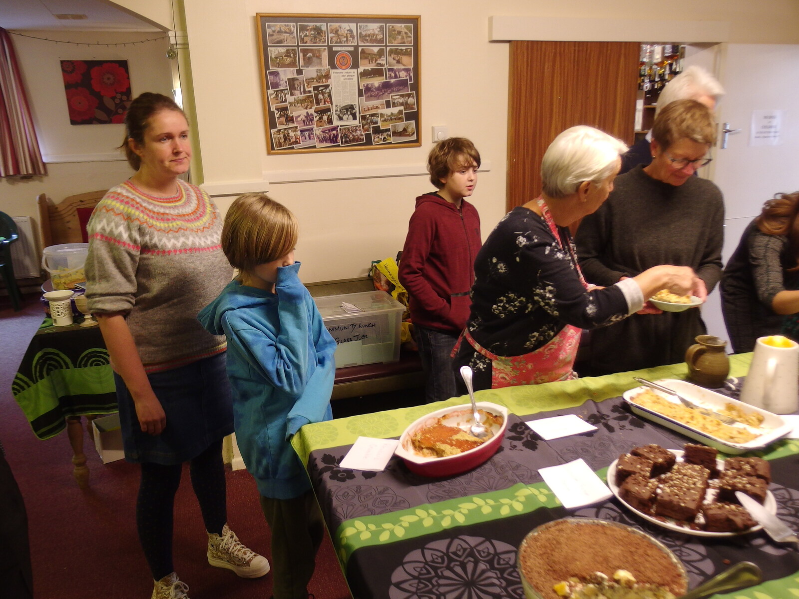 Harry and Isobel line up for pudding from Sunday Lunch at the Village Hall, Brome, Suffolk - 10th October 2021