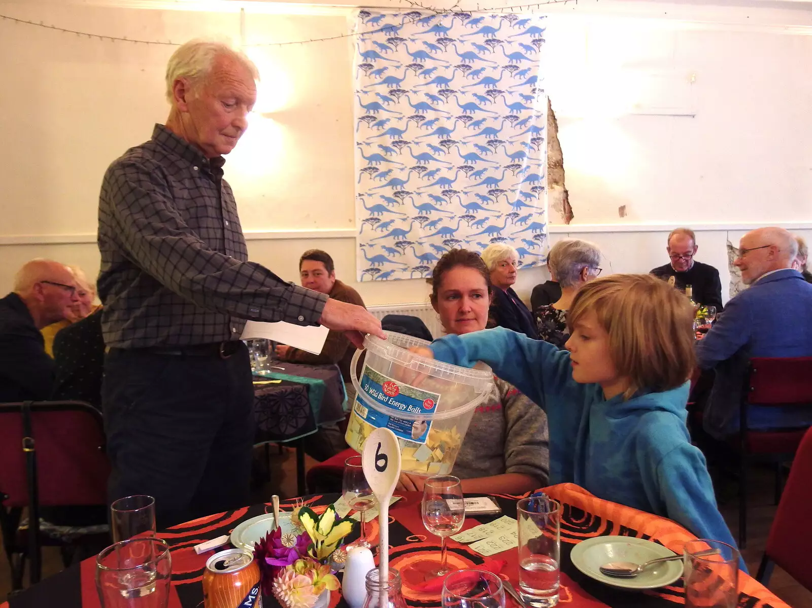 Harry helps draw out a raffle ticket, from Sunday Lunch at the Village Hall, Brome, Suffolk - 10th October 2021