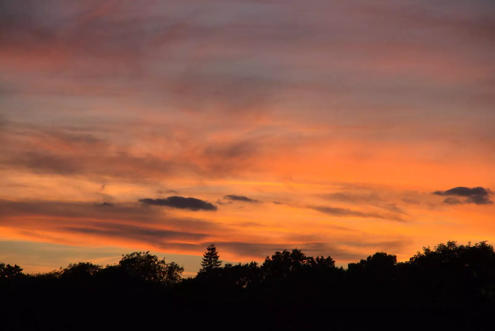 There's a dramatic sunset over the side field, from Sunday Lunch at the Village Hall, Brome, Suffolk - 10th October 2021