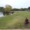 Fred sits on the bank of the lake, A Trip to Weybread Sailing Club, Harleston, Norfolk - 17th October 2021
