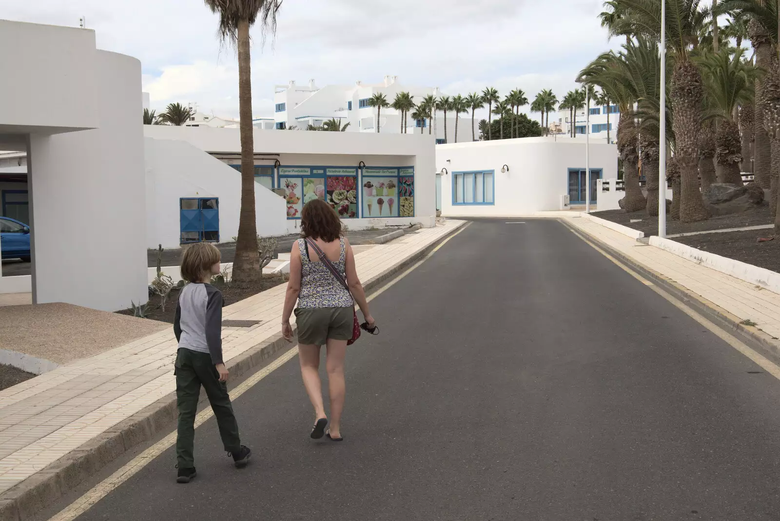 Harry and Isobel wander up the road, from Five Days in Lanzarote, Canary Islands, Spain - 24th October 2021