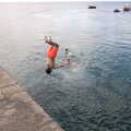 A boy hurls himself off the pier, Five Days in Lanzarote, Canary Islands, Spain - 24th October 2021