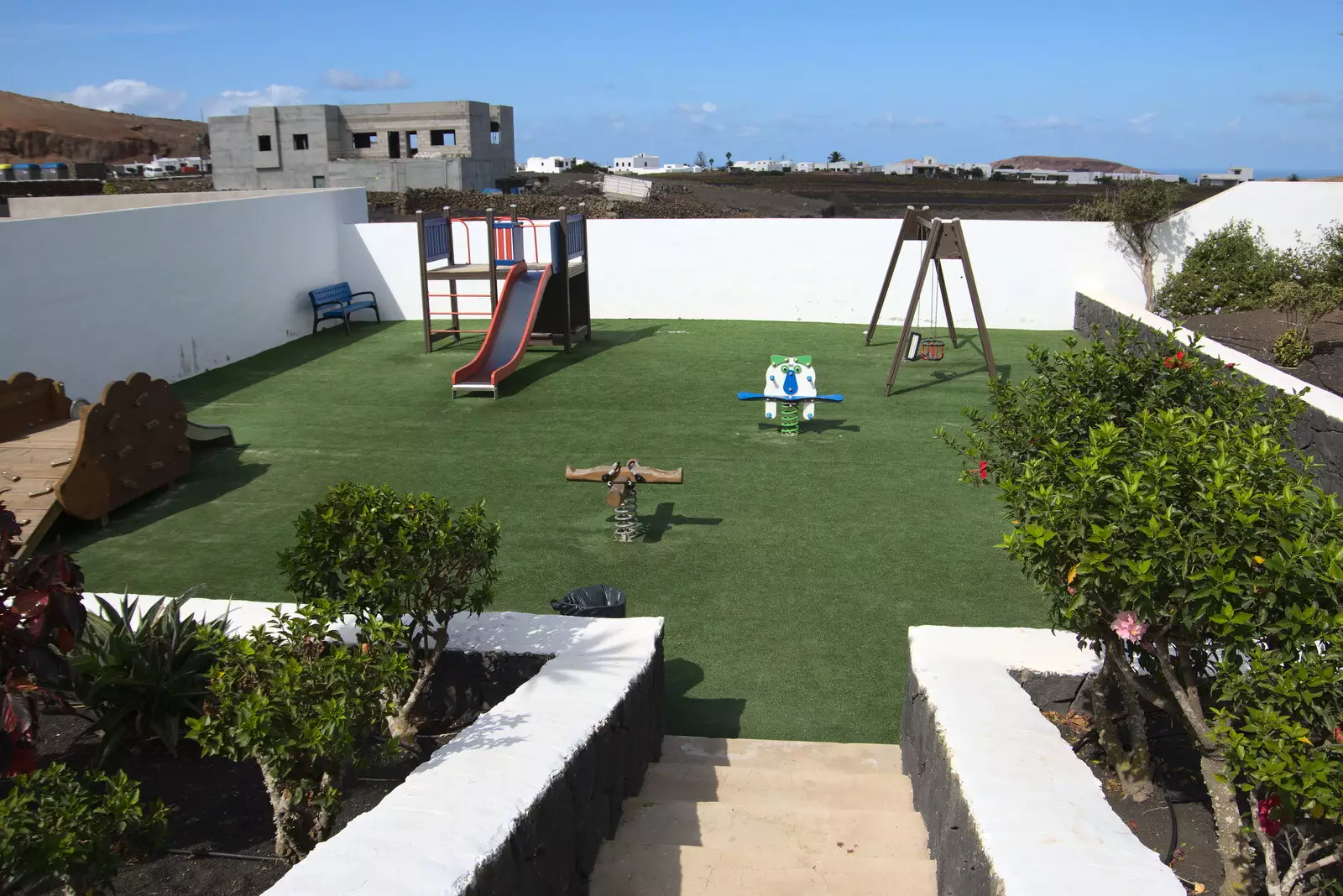 A playground is an oasis of green , from The Volcanoes of Lanzarote, Canary Islands, Spain - 27th October 2021