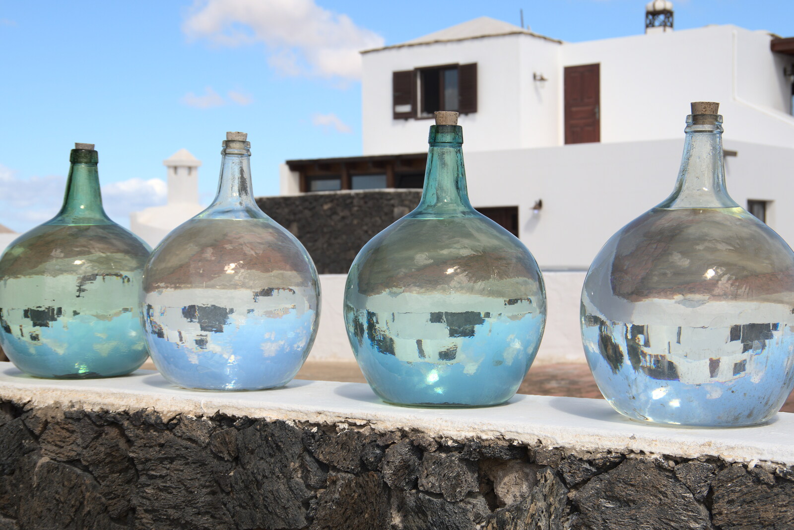 Bottles of water on a wall from The Volcanoes of Lanzarote, Canary Islands, Spain - 27th October 2021