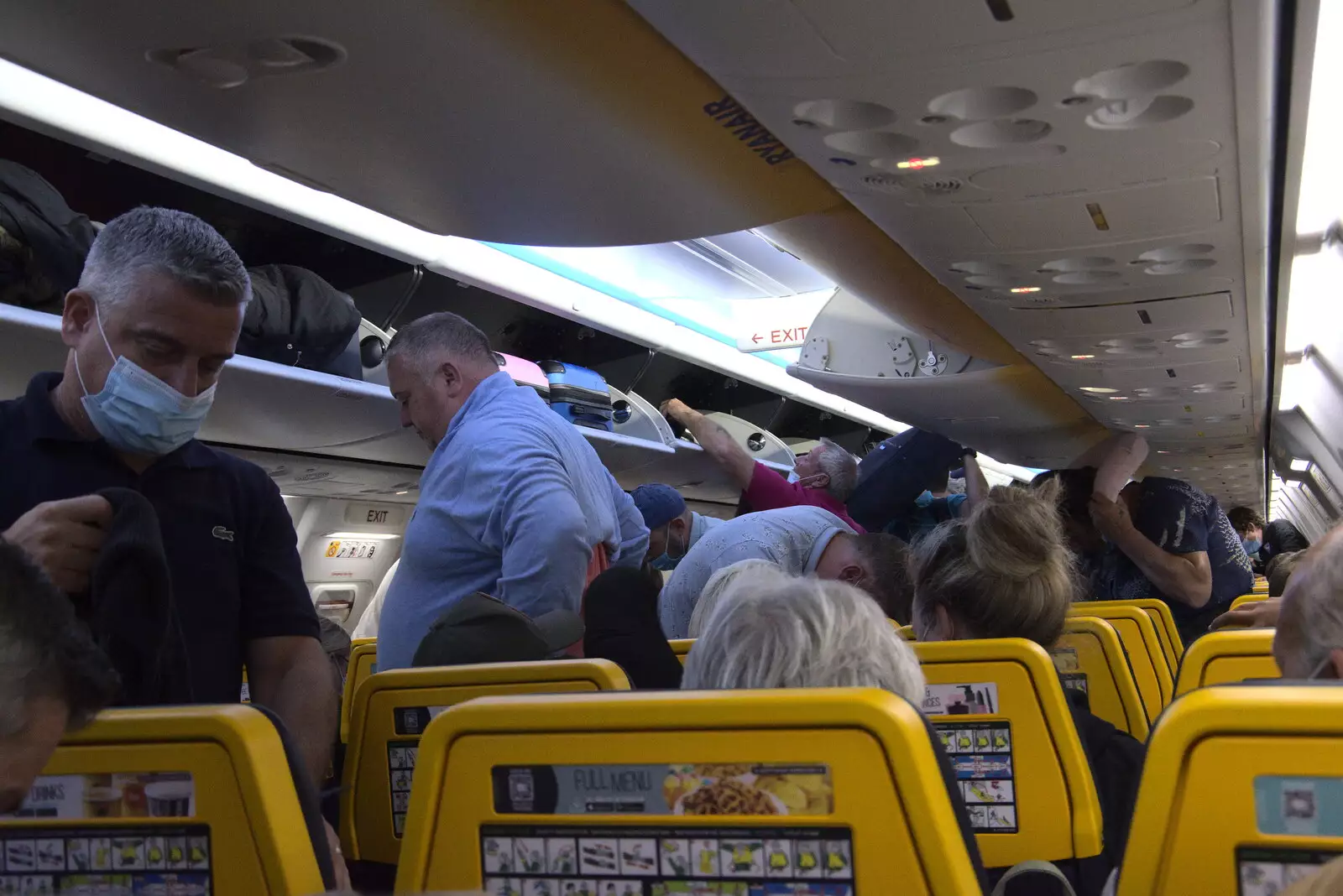 The scrum on board after the plane parks up, from The Volcanoes of Lanzarote, Canary Islands, Spain - 27th October 2021