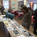 Isobel scopes out the photo collection, Brome Village Hall's 50th Anniversary, Brome, Suffolk - 12th November 2021