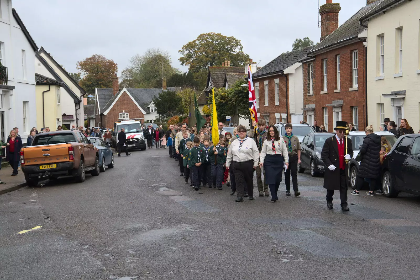 The parade reaches Broad Street, from The GSB and Remembrance Day Parades, Eye and Botesdale, Suffolk - 14th November 2021