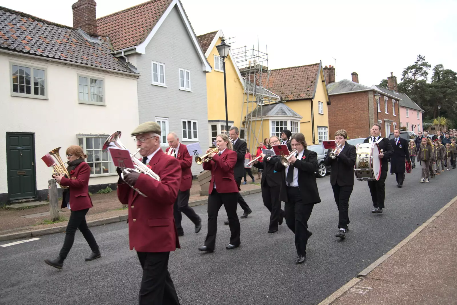 The parade winds its way through Botesdale, from The GSB and Remembrance Day Parades, Eye and Botesdale, Suffolk - 14th November 2021