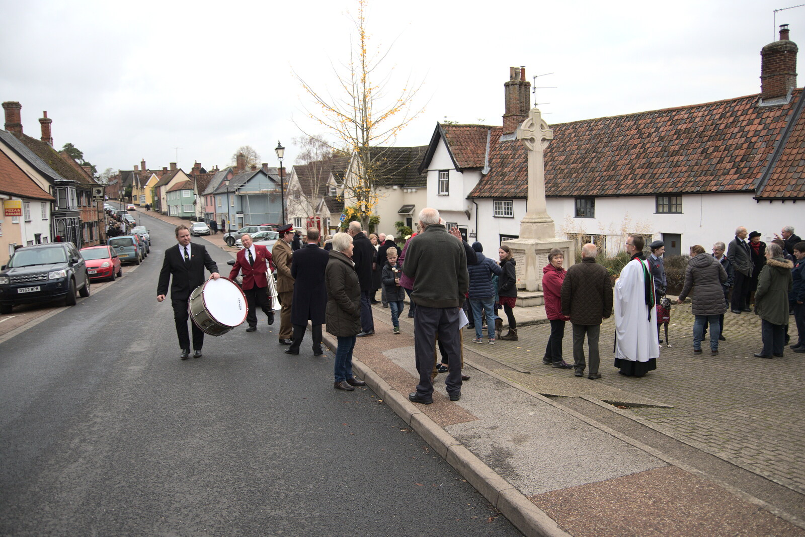 The bass drummer heads off from The GSB and Remembrance Day Parades, Eye and Botesdale, Suffolk - 14th November 2021