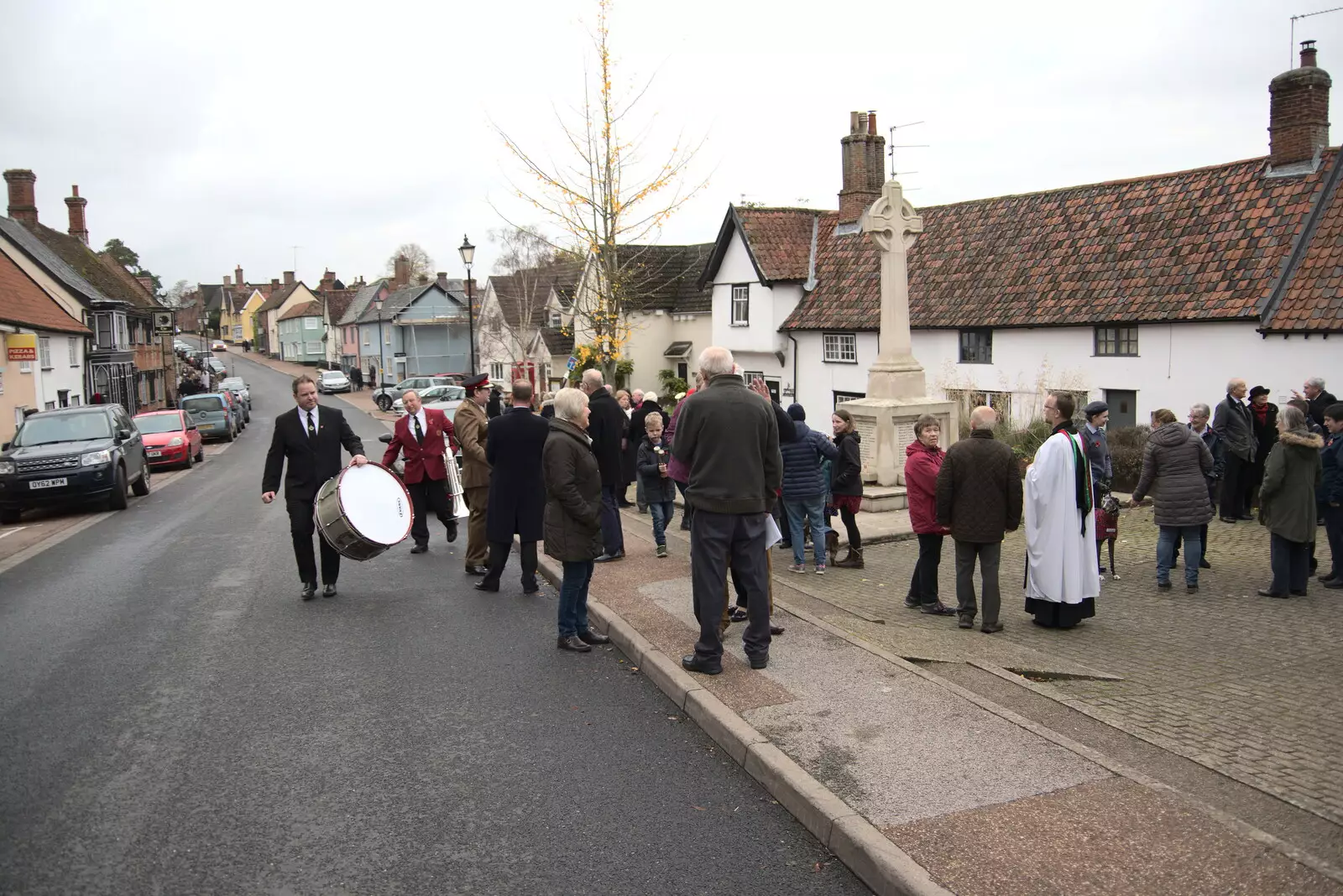 The bass drummer heads off, from The GSB and Remembrance Day Parades, Eye and Botesdale, Suffolk - 14th November 2021