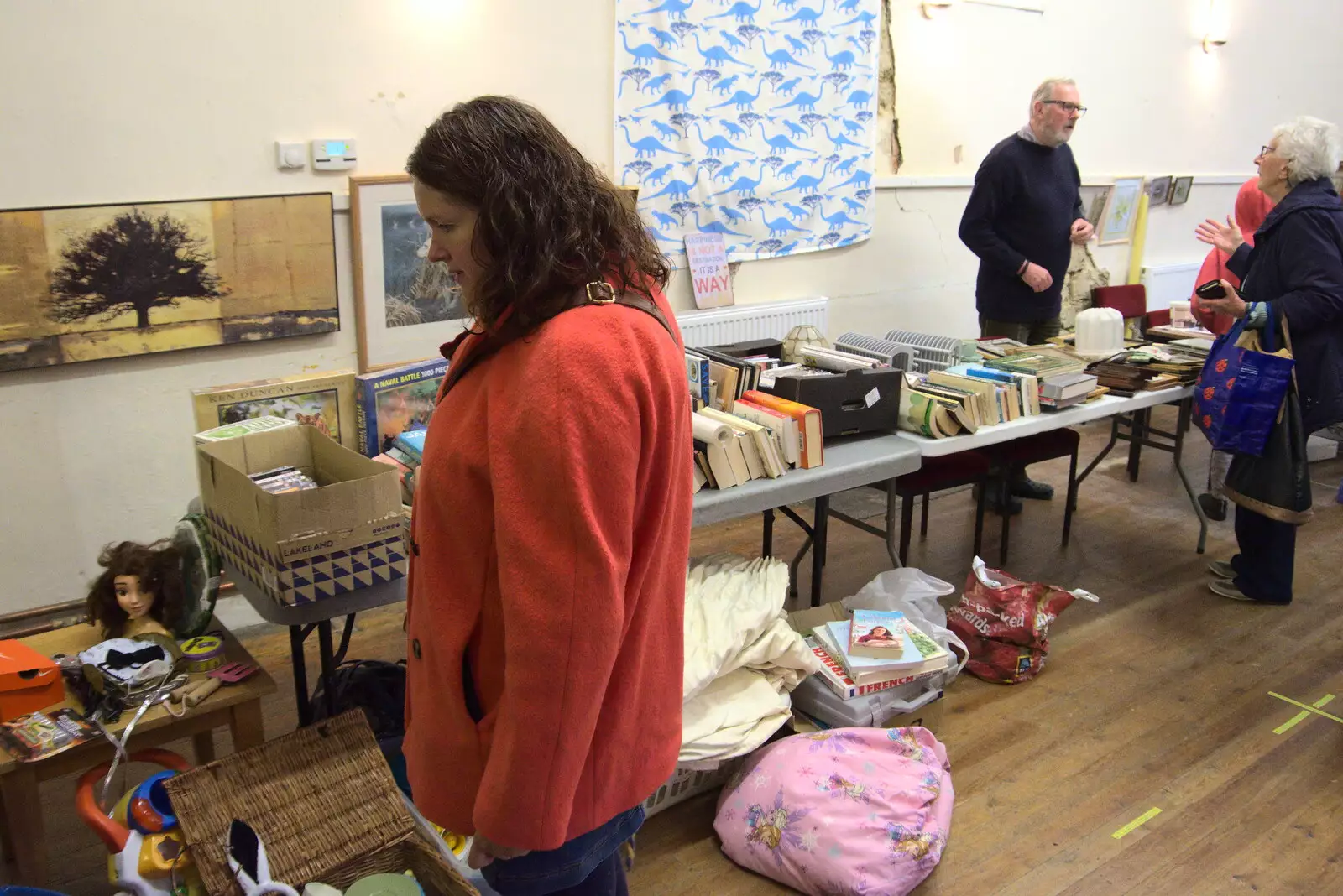 Isobel pokes around in the village hall, from Norwich Lights and a Village Hall Jumble Sale, Brome, Suffolk - 20th November 2021