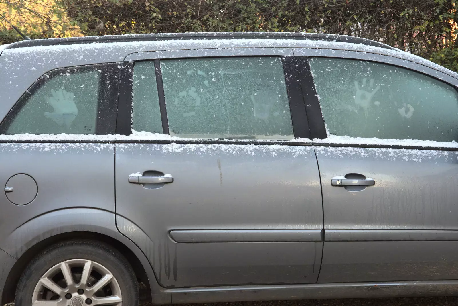 The boys do handprints on the frozen car, from The Eye Lights Switch On, Eye, Suffolk - 3rd December 2021