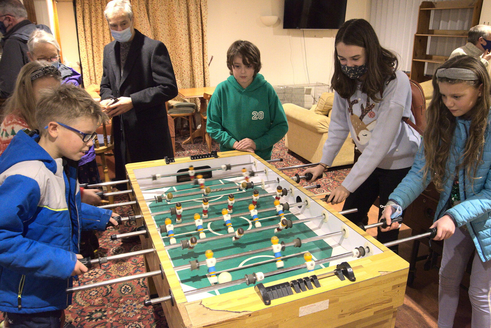 Fred watches some table football from Dove Players' Trouble in Pantoland, Eye Community Centre, Suffolk - 11th December 2021