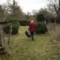 A horn player leaves the church , GSB Carols and Beer With the Lads, Thornham and Thorndon, Suffolk  - 18th December 2021