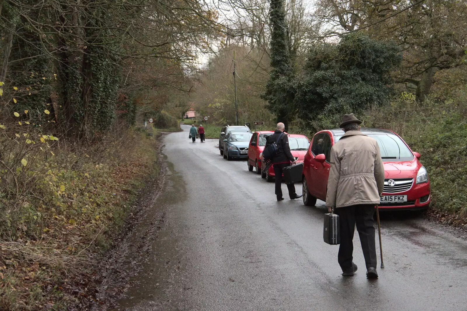 The band disperses along the street in Thornham, from GSB Carols and Beer With the Lads, Thornham and Thorndon, Suffolk  - 18th December 2021