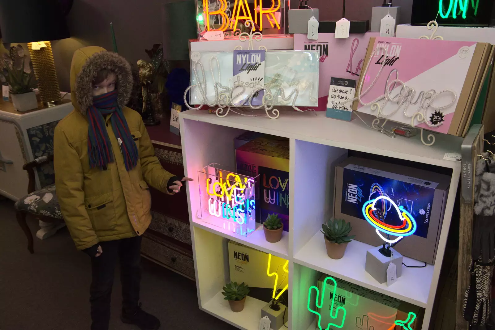 Harry points at neon lights in Hillary and Alice, from GSB Carols and Beer With the Lads, Thornham and Thorndon, Suffolk  - 18th December 2021