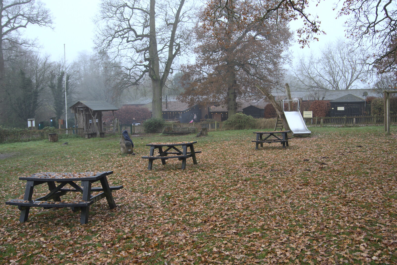 Thornham playground with its covering of leaves from A Return to Thornham Walks, Thornham, Suffolk - 19th December 2021