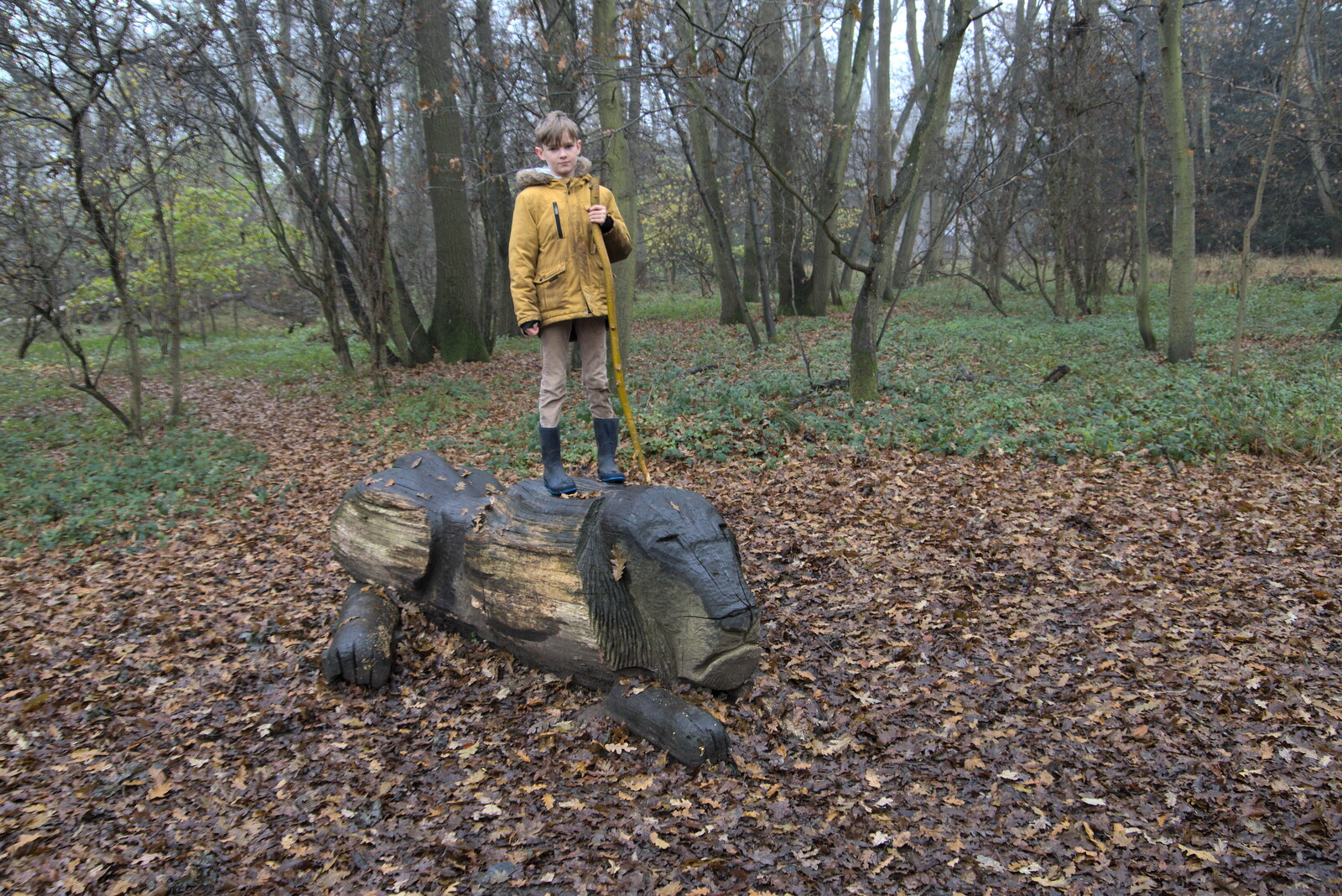 Harry stands on the old grumpy lion from A Return to Thornham Walks, Thornham, Suffolk - 19th December 2021