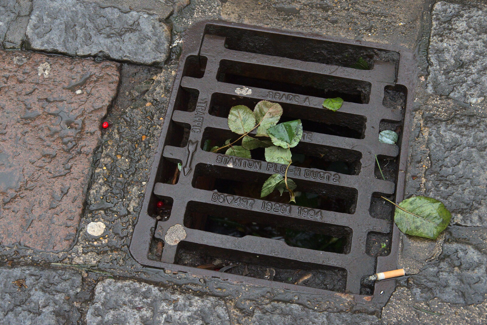 It's discovered that drain covers have a direction from Scooters and a Bit of Christmas Shopping, Eye and Norwich, Norfolk - 23rd December 2021