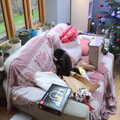 A kitten sits on wrapping paper, Christmas Day at Home, Brome, Suffolk - 25th December 2021