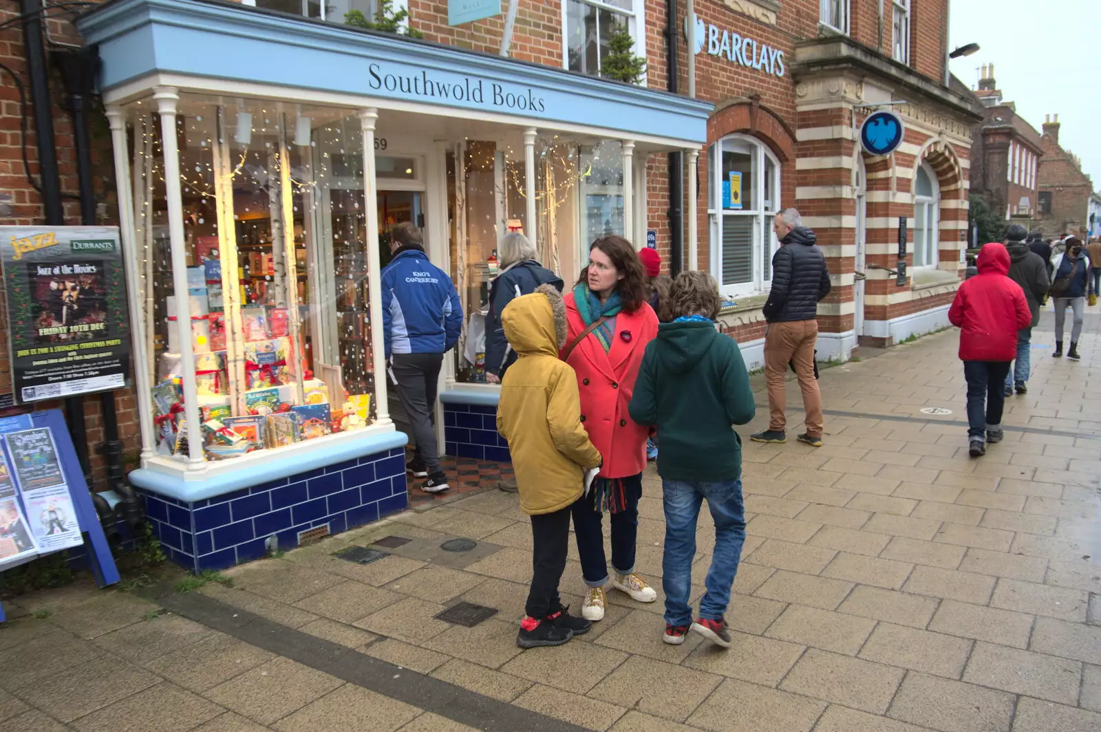 We pause outside Southwold Books, from A Few Hours at the Seaside, Southwold, Suffolk - 27th December 2021