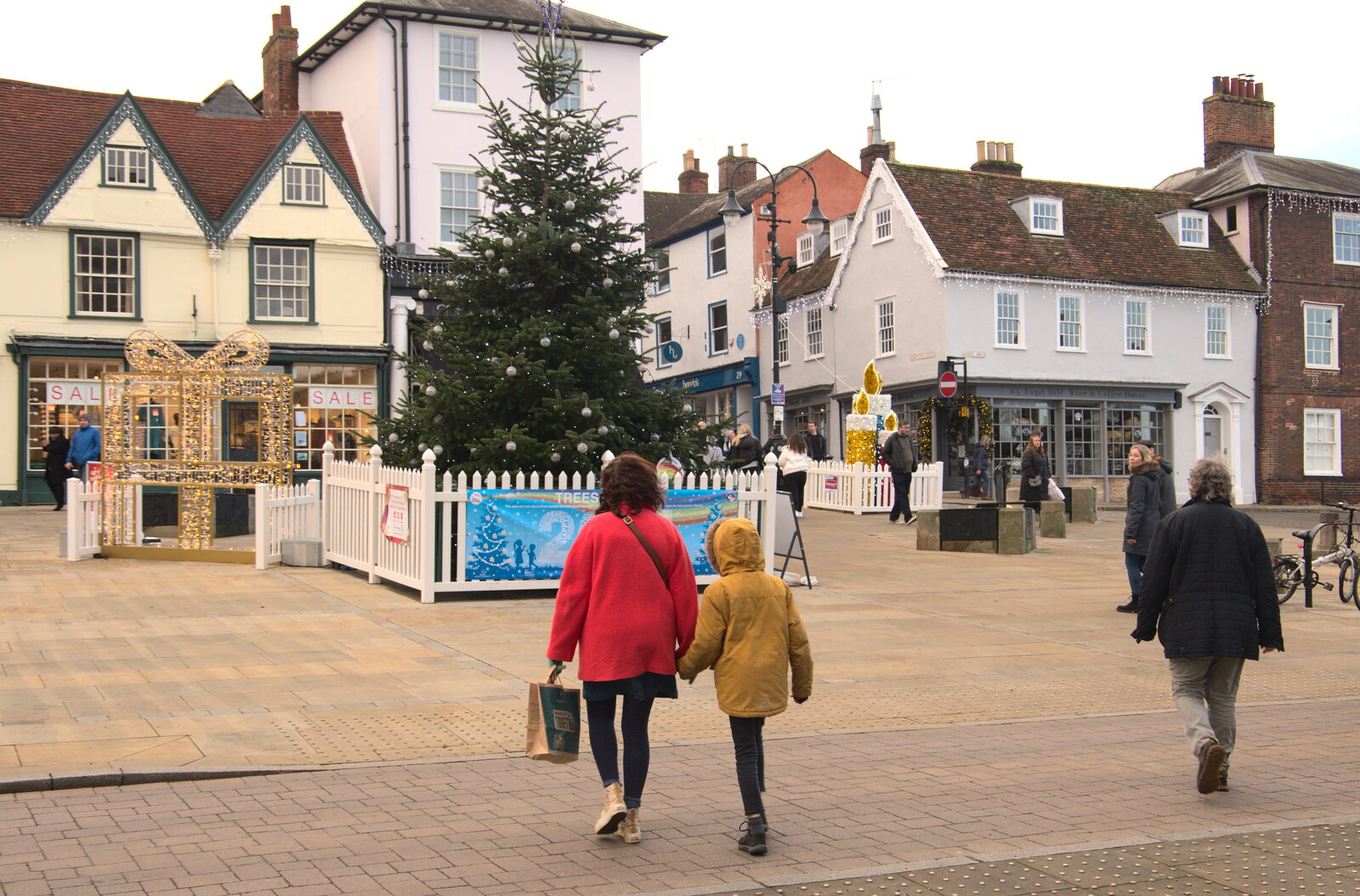 Harry and Isobel cross Angel Hill from A Few Hours in Bury St. Edmunds, Suffolk - 3rd January 2022