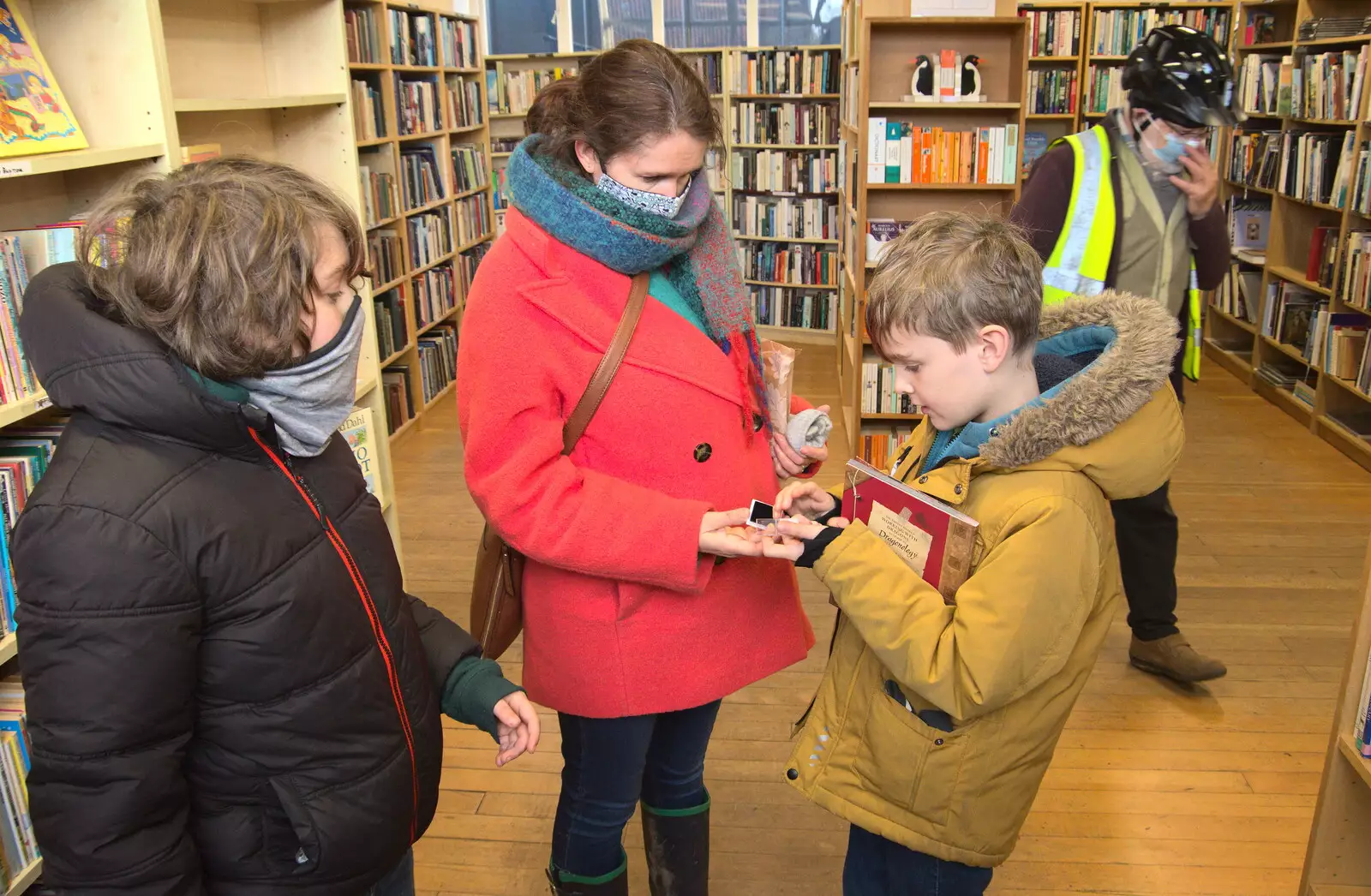 Harry buys a book, from A Visit to Blickling Hall, Aylsham, Norfolk - 9th January 2022