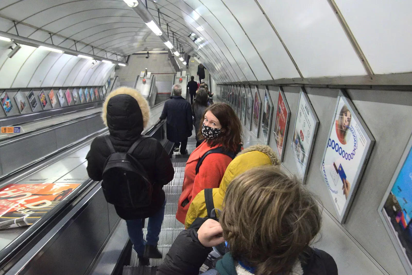 Isobel looks back on the escalator, from A Trip to the Natural History Museum, Kensington, London - 15th January 2022