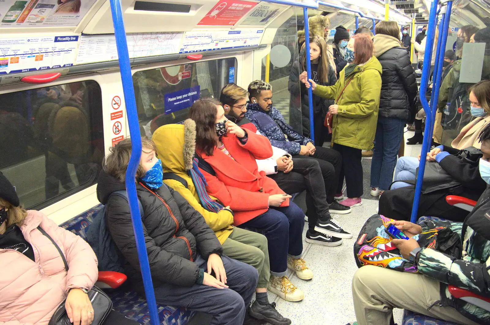 Isobel and the boys on the tube, from A Trip to the Natural History Museum, Kensington, London - 15th January 2022