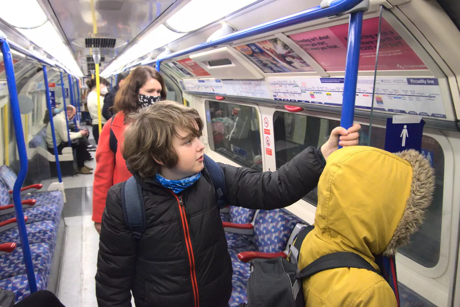 Harry and Fred wait to get off the tube, from A Trip to the Natural History Museum, Kensington, London - 15th January 2022