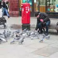 Some dude feeds the pigeons, A Trip to the Natural History Museum, Kensington, London - 15th January 2022