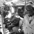 Isobel on the tube train, A Trip to the Natural History Museum, Kensington, London - 15th January 2022