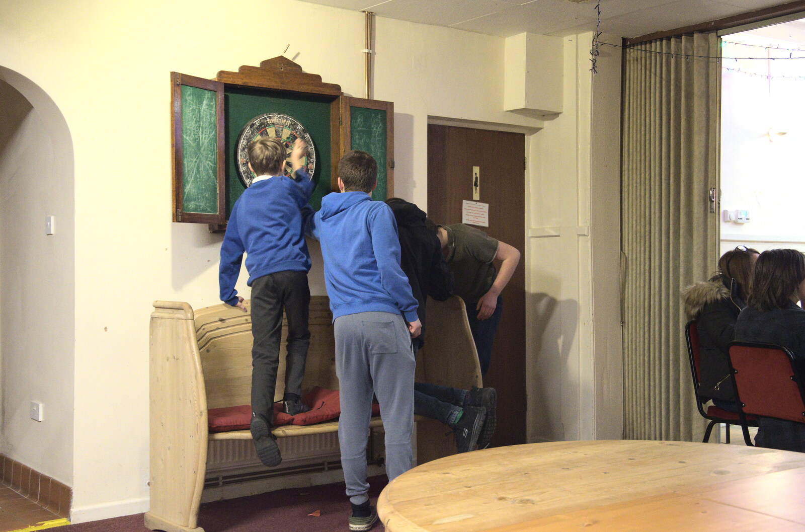 The boys pull their darts out of the board from Supercharged Electrons and Pizza at the Village Hall, Brome, Suffolk - 23rd January 2022