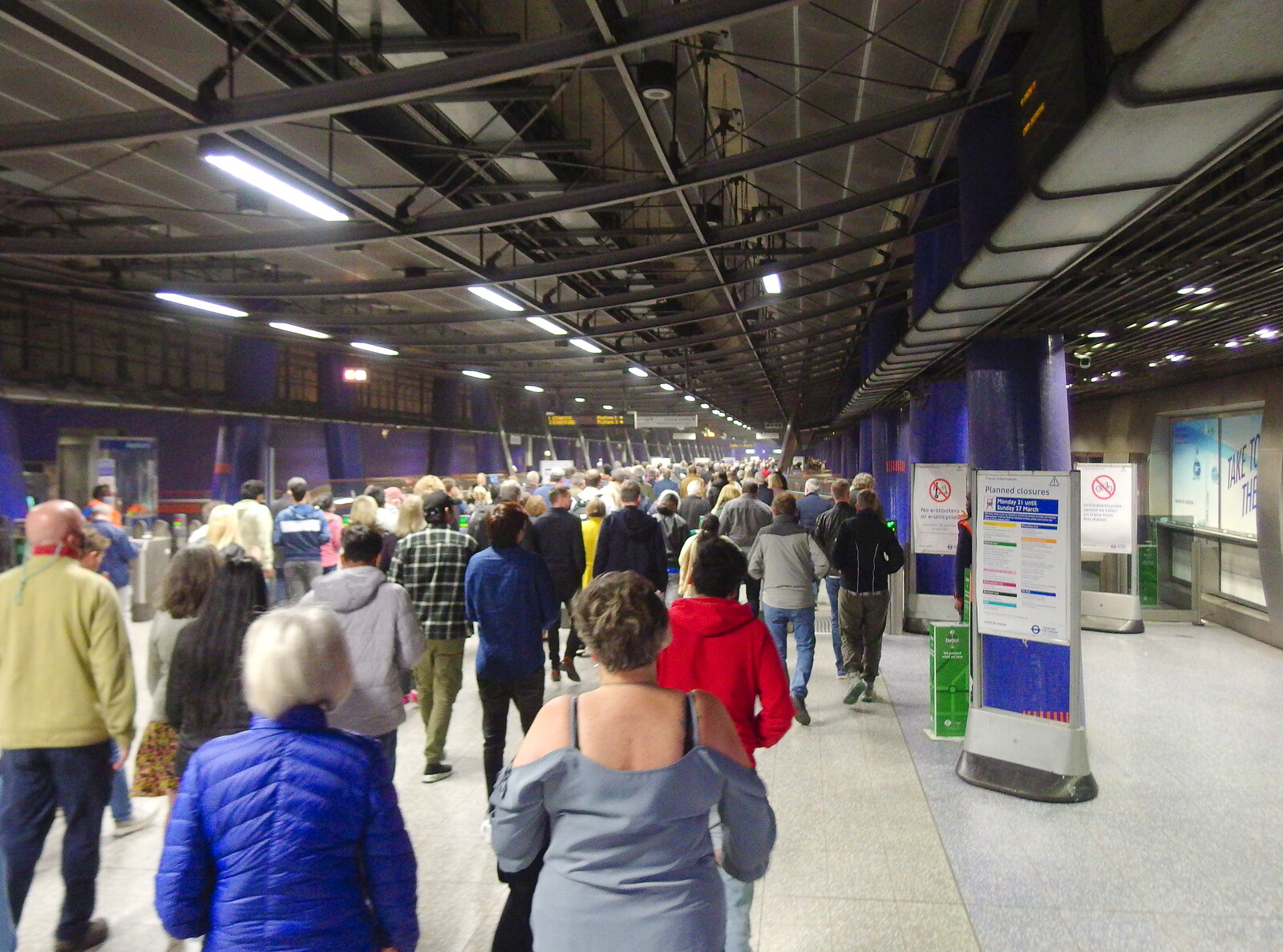 Herds of people at Greenwich North tube station  from Genesis at the O2, North Greenwich, London - 24th March 2022