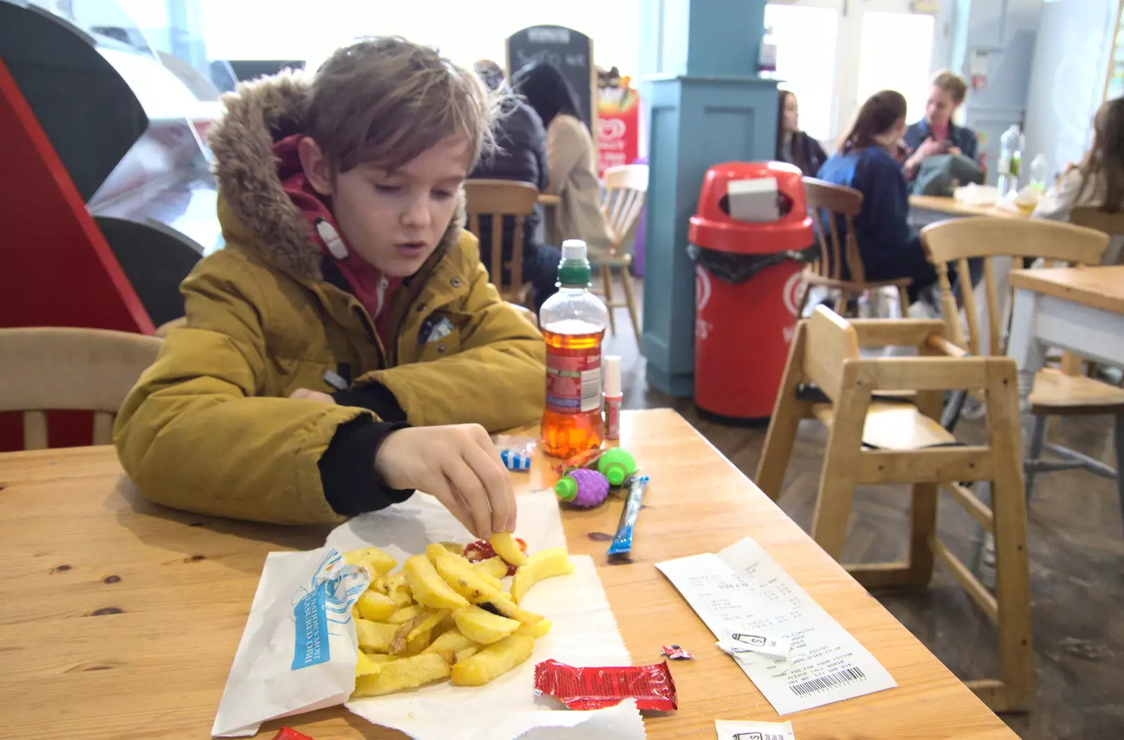 We share a portion of chips in the pier café, from Genesis at the O2, North Greenwich, London - 24th March 2022