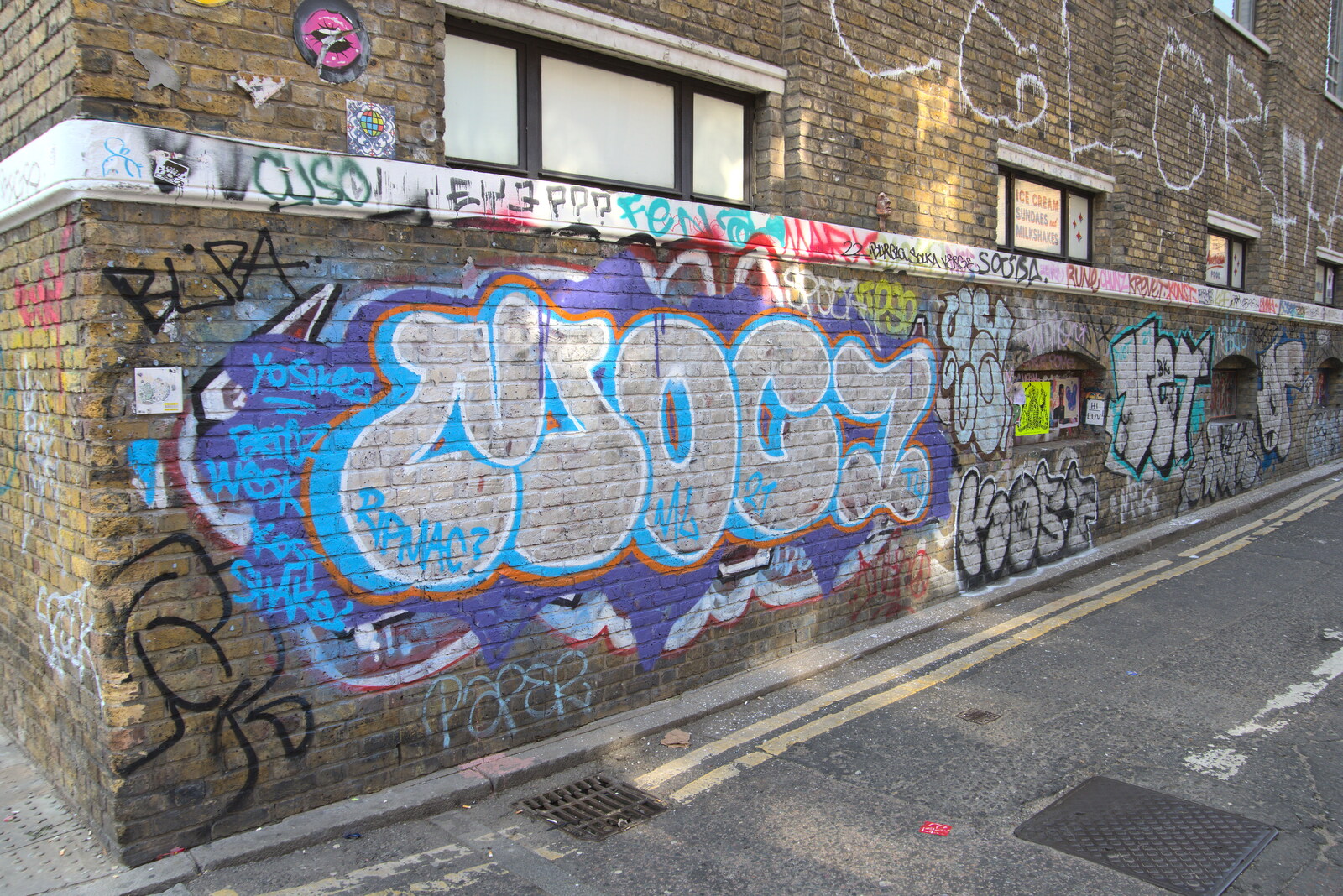 A Walk Around the South Bank, London - 25th March 2022: Graffiti on a brick wall