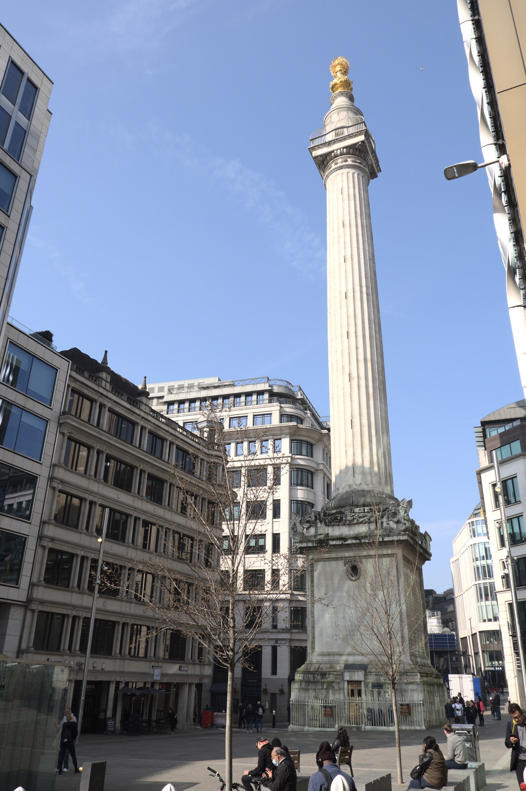 A Walk Around the South Bank, London - 25th March 2022: The Great Fire Monument is almost hidden