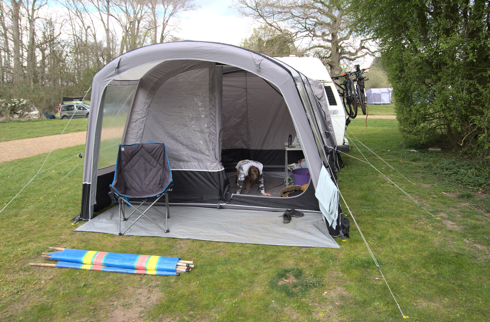 A Camper-Van Trip, West Harling, Norfolk - 13th April 2022: Harry pokes about in the awning
