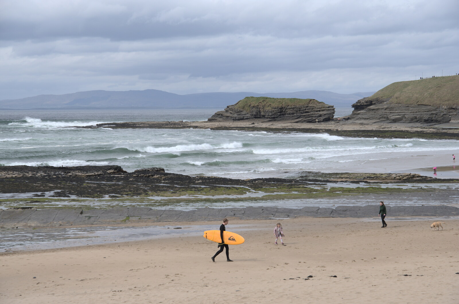 A surfer on Bundoran beach from Manorhamilton and Bundoran, Leitrim and Donegal, Ireland - 16th April 2022
