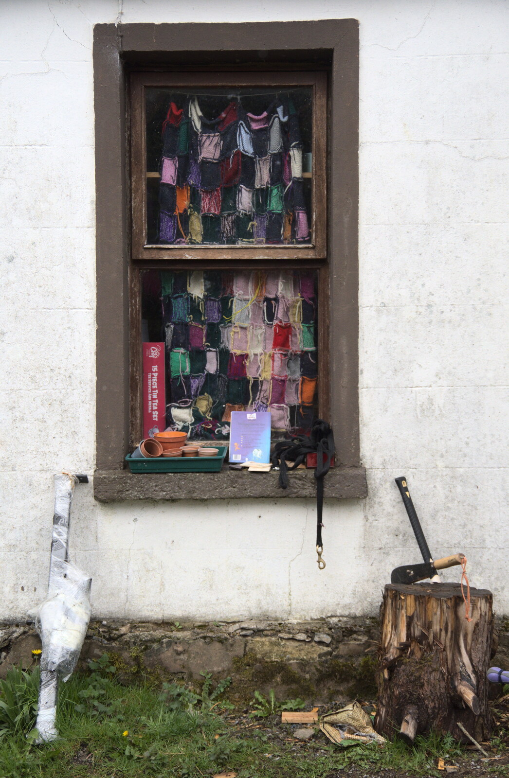 A crochet blanket hangs in a window from Manorhamilton and Bundoran, Leitrim and Donegal, Ireland - 16th April 2022