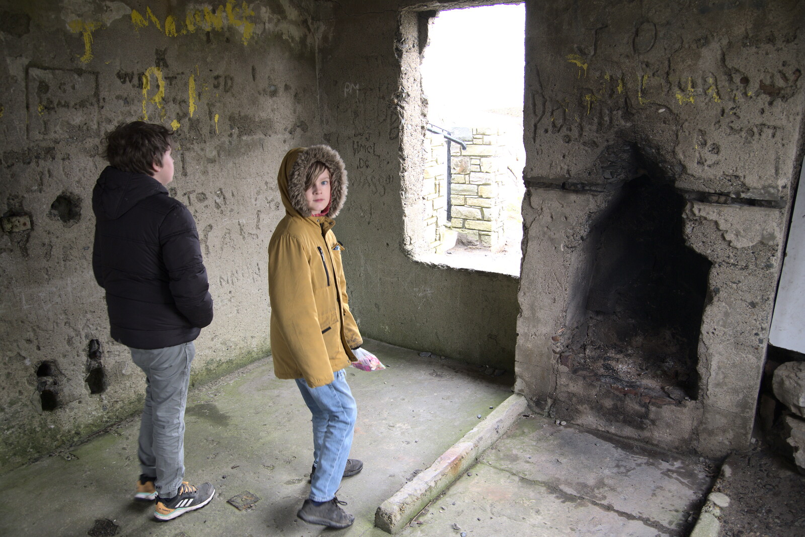 Greencastle, Doagh and Malin Head, County Donegal, Ireland - 19th April 2022: Fred and Harry in a derelict building