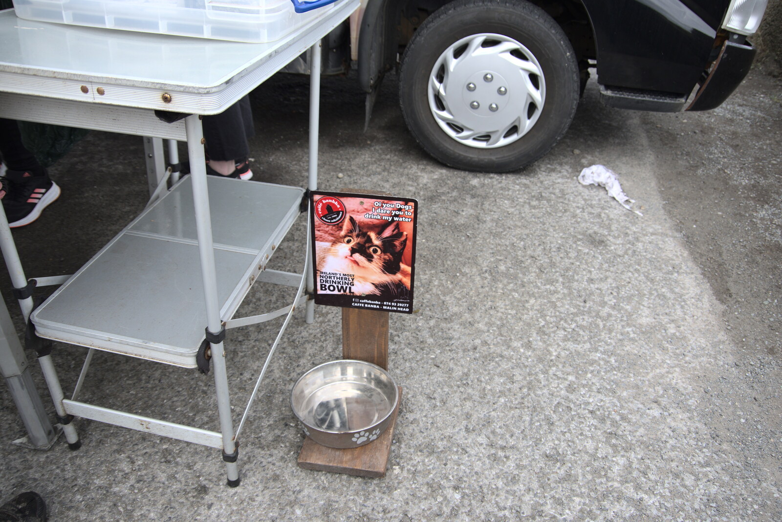 Greencastle, Doagh and Malin Head, County Donegal, Ireland - 19th April 2022: A dog bowl with a scary cat photo